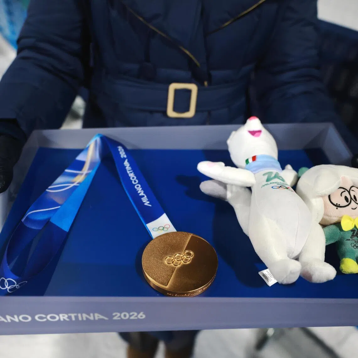 A medal on display after the Women's Big Air of the Snowboarding competitions at the 2026 Milano-Cortina Winter Olympic Games in Livigno on Feb 9, 2026.