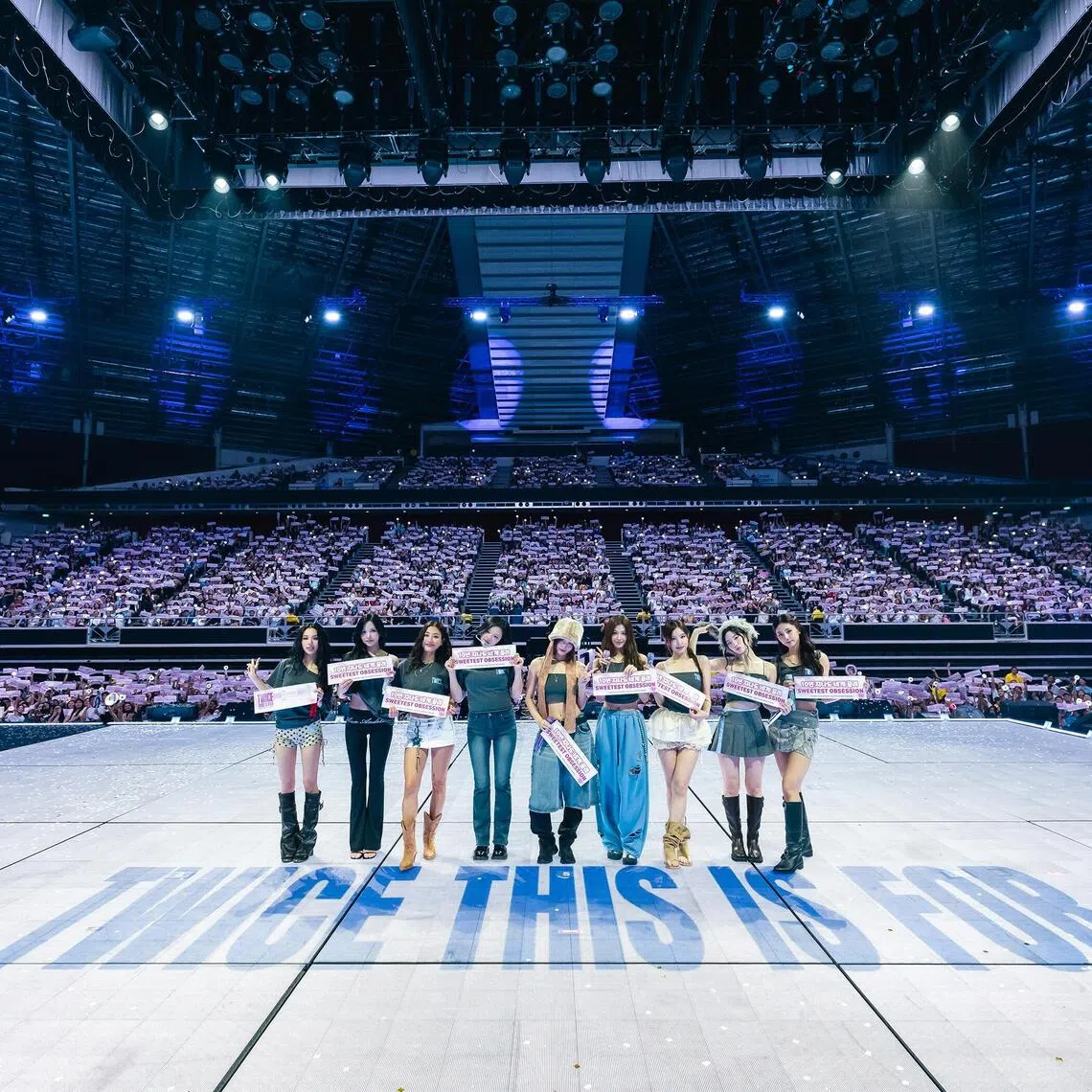 Twice's (from left) Chaeyoung, Mina, Jihyo, Jeongyeon, Momo, Sana, Nayeon, Dahyun and Tzuyu performed to a capacity crowd of 11,000 at the Singapore Indoor Stadium on Oct 11. 