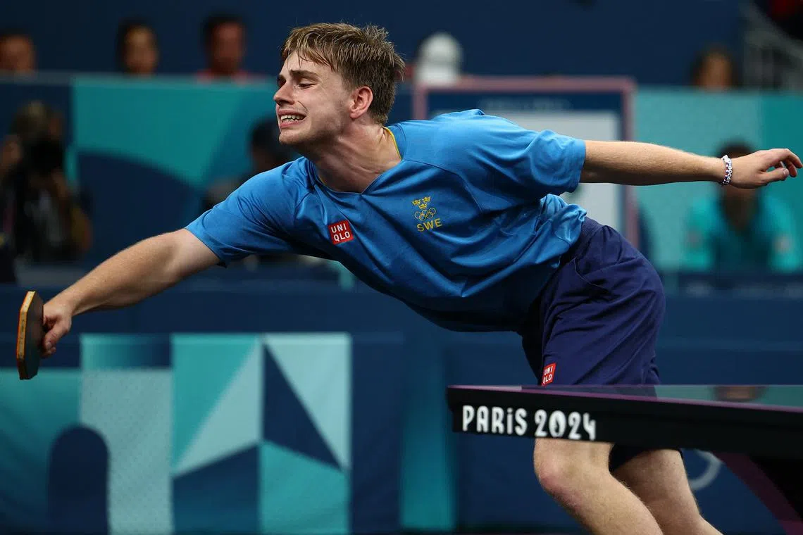 Paris 2024 Olympics - Table Tennis - Men's Team Gold Medal Team Match - South Paris Arena 4, Paris, France - August 09, 2024. Truls Moregard of Sweden in action during his gold medal match against Zhendong Fan of China. REUTERS/Kim Hong-Ji