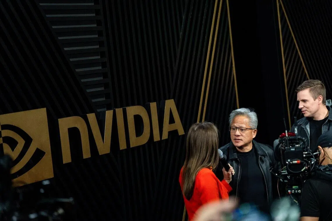 Mr Jensen Huang, chief executive of Nvidia (centre) spoke to the media at the Nvidia GPU Technology Conference in Washington, DC on Oct. 28. 