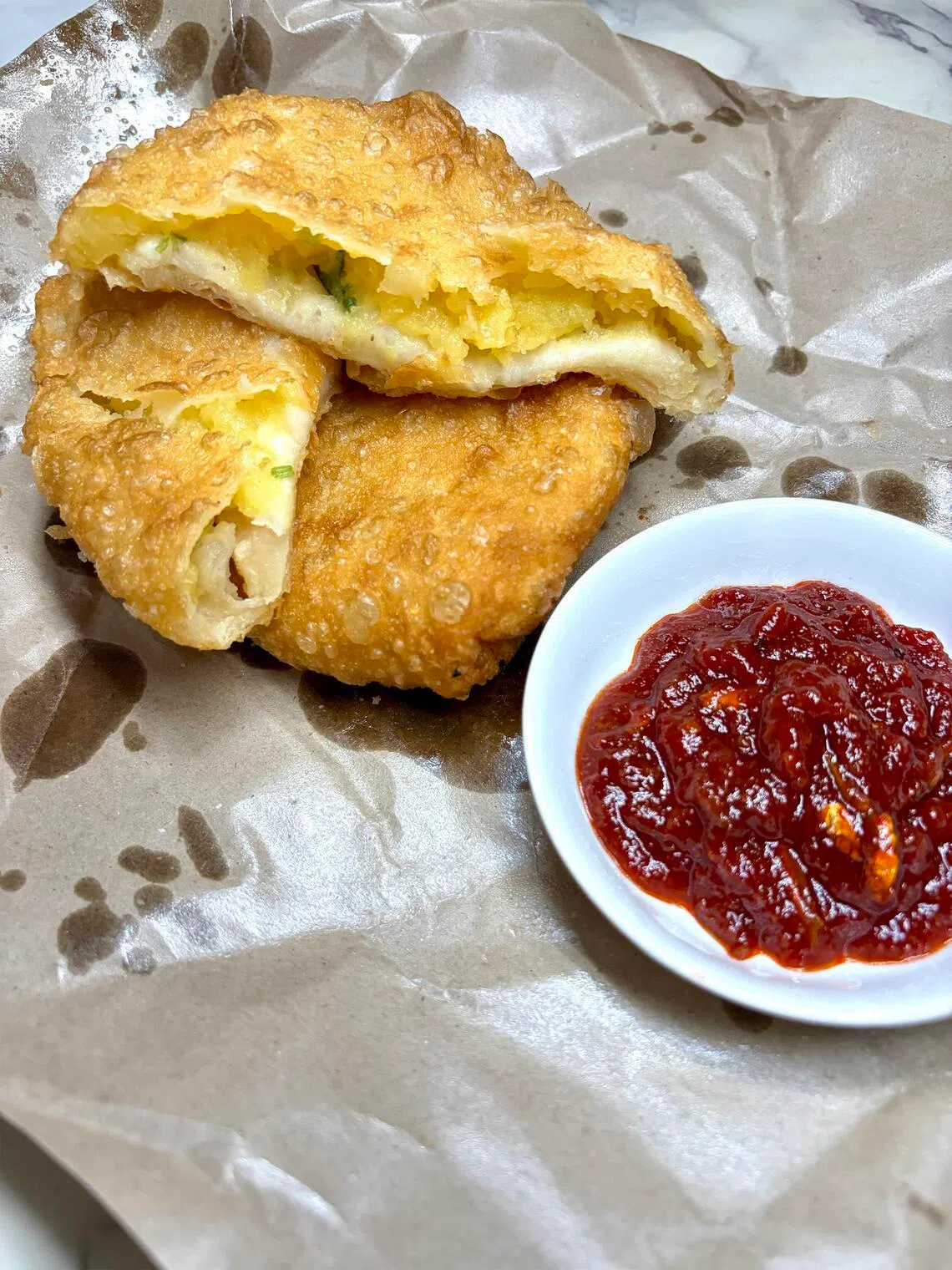 Roti Boyan with sweet and spicy sambal. 