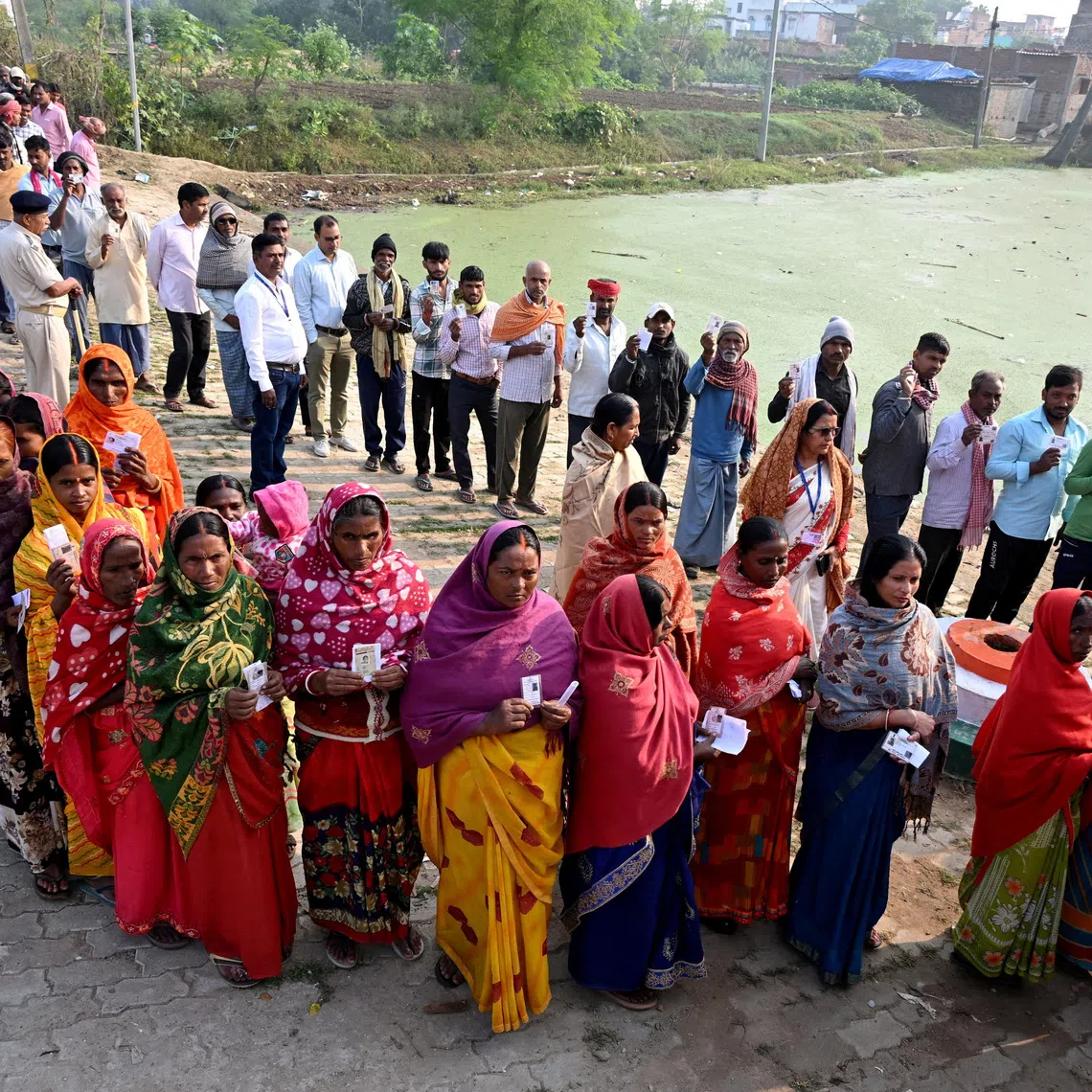 People queue to cast their vote outside a polling station, during the second and final phase of Bihar state assembly election, in Jehanabad, India, November 11, 2025. REUTERS/Sonu Kishan