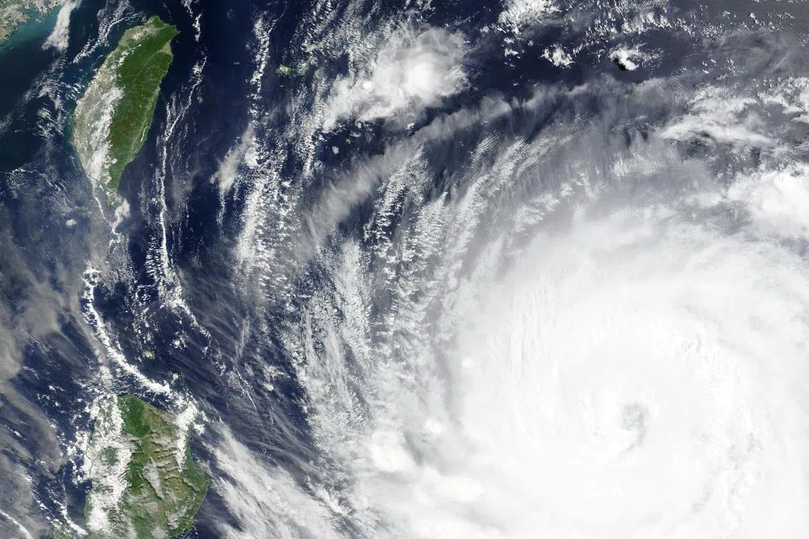 A satellite image shows Typhoon Bavi as it churns in the Pacific Ocean on July 9.
