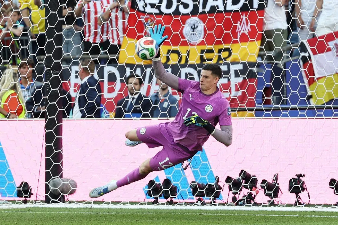 Soccer Football - FIFA World Cup 2026 - Round of 32 - Germany v Paraguay - Boston Stadium, Foxborough, Massachusetts, U.S. - June 29, 2026 Paraguay's Orlando Gill saves a penalty from Germany's Kai Havertz during the penalty shootout REUTERS/Amanda Perobelli