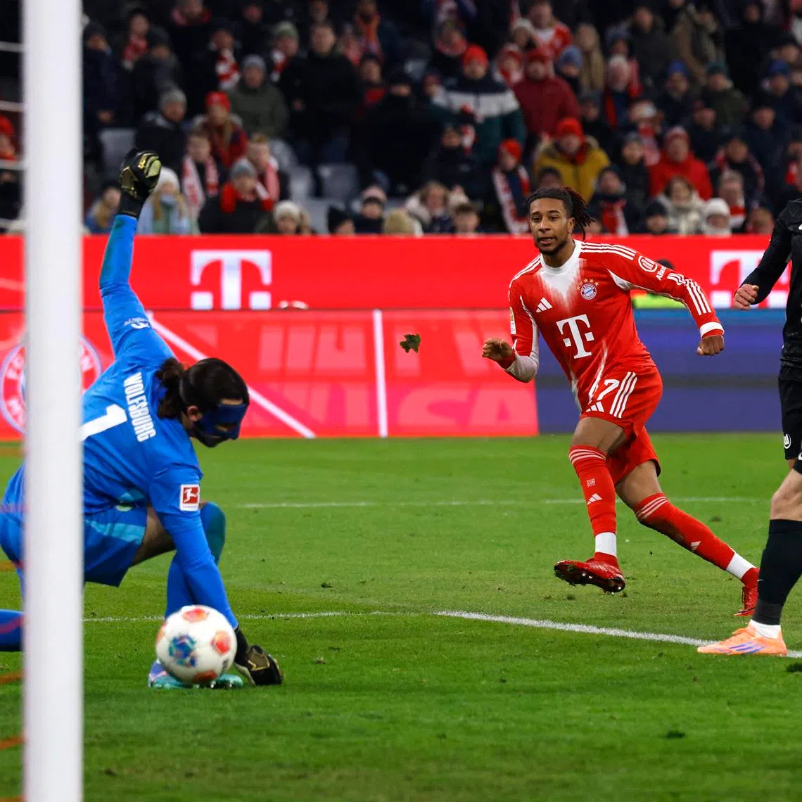 Soccer Football - Bundesliga - Bayern Munich v VfL Wolfsburg - Allianz Arena, Munich, Germany - January 11, 2026  Bayern Munich's Michael Olise scores their seventh goal REUTERS/Michaela Stache