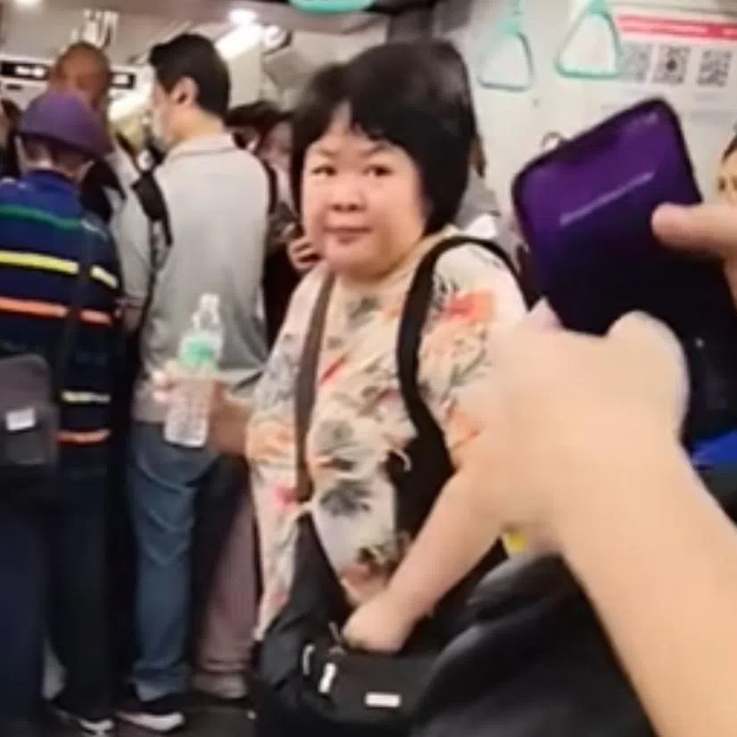 Sabrina Han Meizhen is accused of spitting water at a female passenger, causing annoyance to the latter and other members of the public.