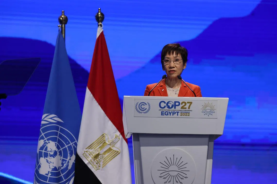 Singapore's Minister of Environment Grace Fu delivers a speech at the Sharm el-Sheikh International Convention Centre, in Egypt's Red Sea resort city of the same name, during the COP27 climate conference on November 15, 2022. (Photo by AHMAD GHARABLI / AFP)