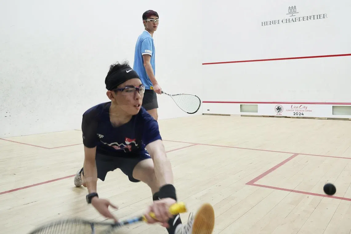 Singapore's Ethan Kuan (in dark blue) won a silver at the Lion City Junior Open, which saw Singapore clinch two golds and three silver medals during the final day on June 2.