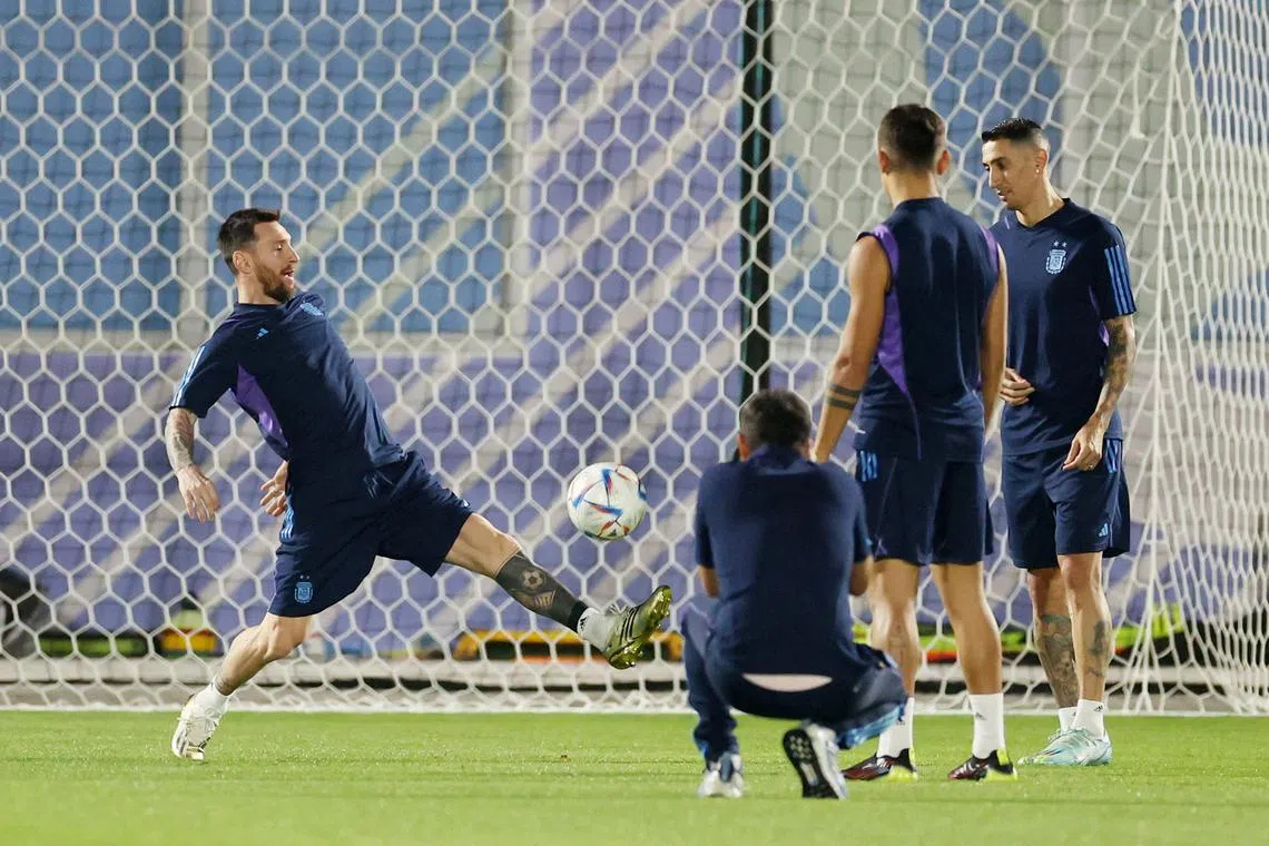 Argentina's Lionel Messi and Angel di Maria during training.