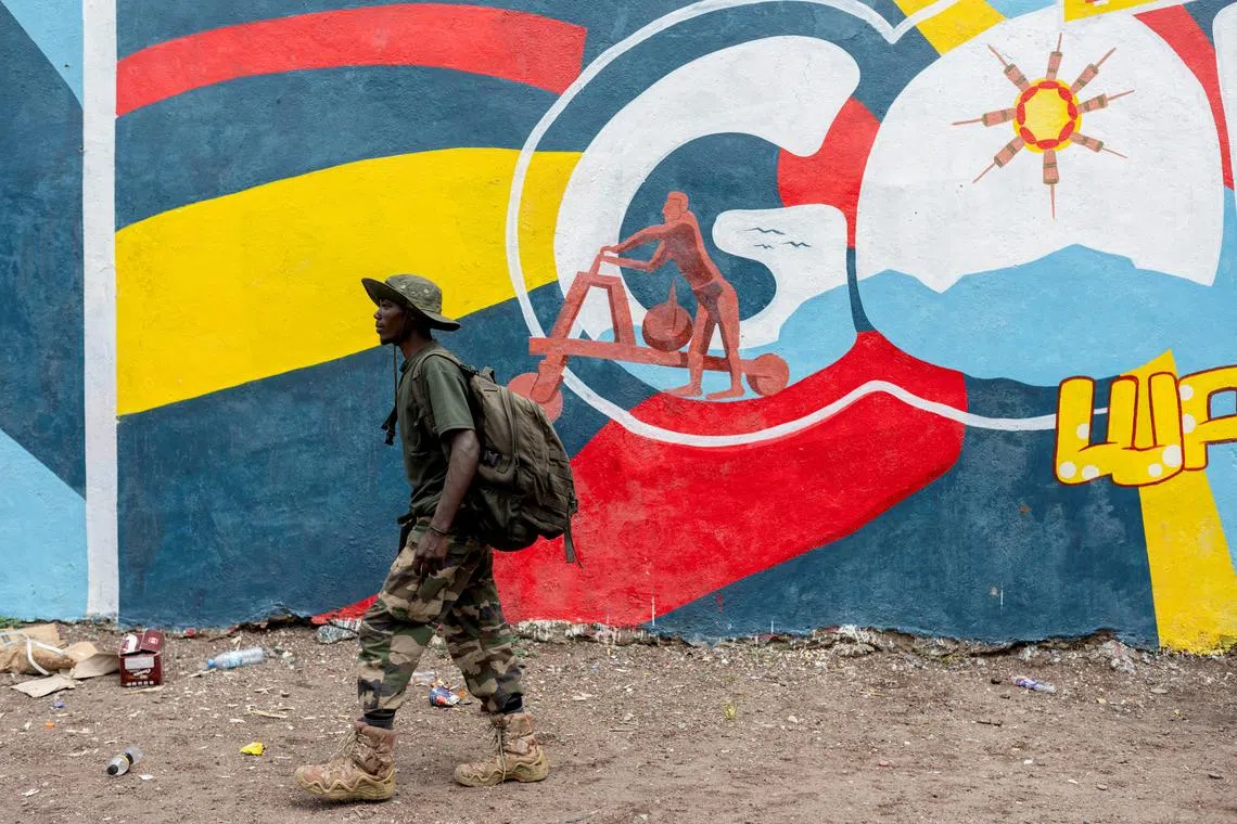 A member of the M23 rebel group patrols the streets, amid clashes between M23 rebels and the Armed Forces of the Democratic Republic of the Congo (FARDC), in Goma, North Kivu province in eastern Democratic Republic of the Congo, January 30, 2025. REUTERS/Arlette Bashizi