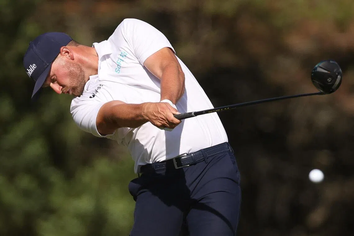 Leader Wyndham Clark playing his tee shot on hole 6 during the third round of the US Open golf tournament at Shinnecock Hills Golf Club. 