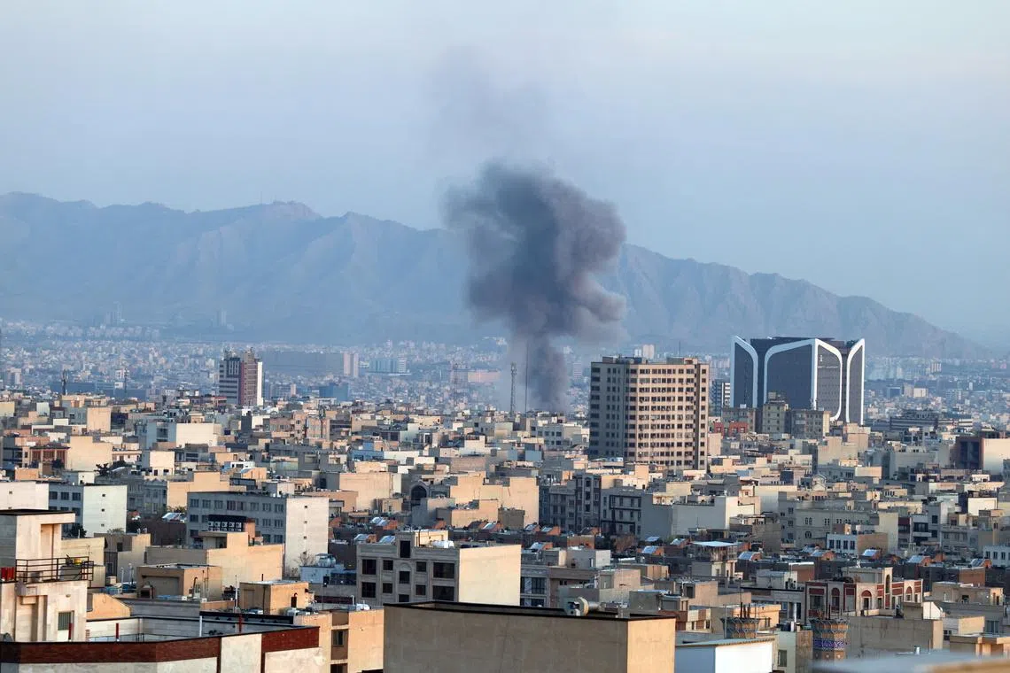 Smoke rises after an airstrike in central Tehran, Iran, on March 6.