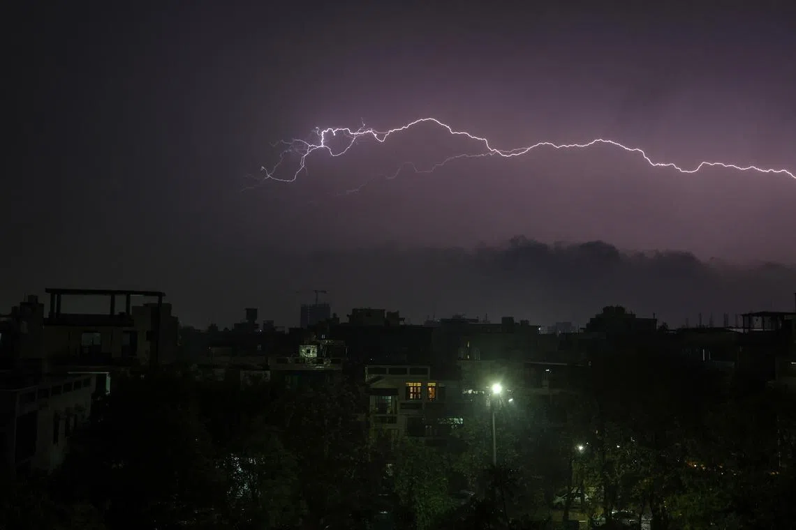 A bolt of lightning illuminating the sky over the city of Faridabad, in Haryana state, India, April 7, 2026. 