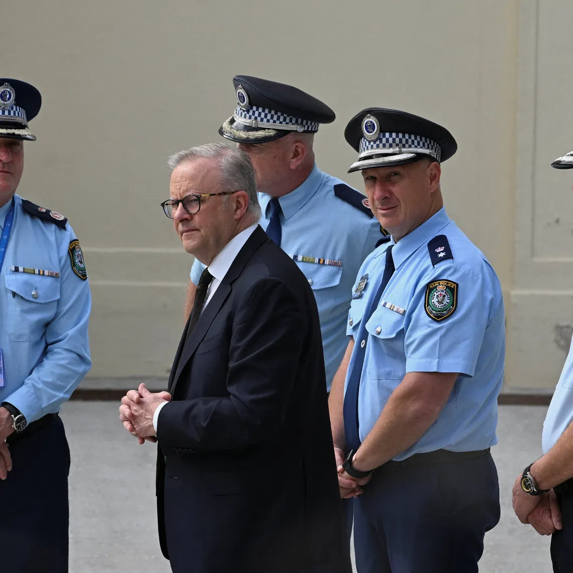Australia's Prime Minister Anthony Albanese visits the scene of the attack on a Jewish holiday celebration at Sydney's Bondi Beach, in Sydney, Australia, December 15, 2025. REUTERS/Flavio Brancaleone