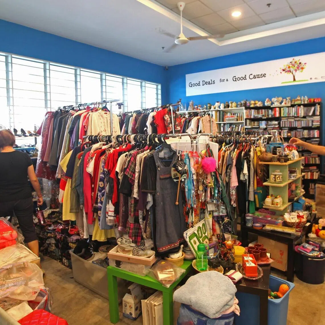People browsing at Something Old Something New, a thrift store located at Simei Care Centre, 10 Simei Street 3. This store, set up in 1999, is partially run by clients of Simei Care Centre, a psychiatric rehabilitation centre. Such thrift stores are a godsend for people wanting to do charity and others looking for quality items at bargain prices.