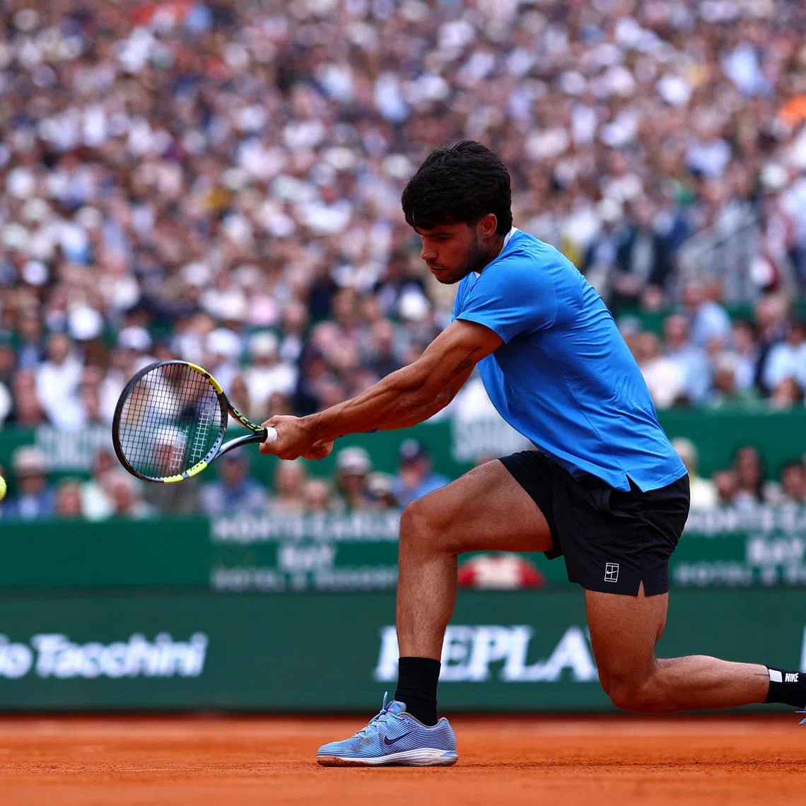 Tennis - ATP Masters 1000 - Monte Carlo Masters - Monte Carlo Country Club, Roquebrune-Cap-Martin, France - April 12, 2026 Spain's Carlos Alcaraz in action during his final match against Italy's Jannik Sinner REUTERS/Manon Cruz