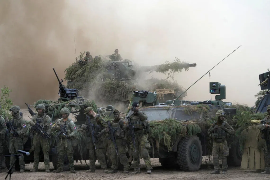 FILE PHOTO: German army servicemen participate in the Quadriga 2024 military exercise in Pabrade, Lithuania May 29, 2024. REUTERS/Ints Kalnins/File Photo