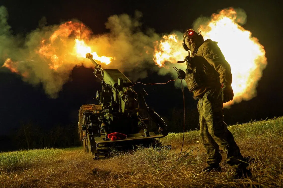 An artilleryman of the Ukrainian Armed Forces firing a Ukrainian self-propelled howitzer 2S22 Bohdana, toward Russian positions, amid Russia's attack on Ukraine, on a frontline in Donetsk region, Ukraine, on May 27, 2026. 