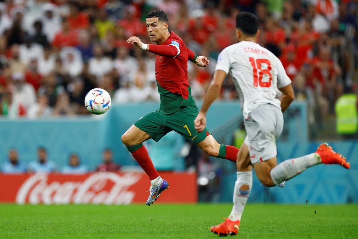 Portugal's Pepe celebrates scoring their second goal with teammates during the Qatar 2022 World Cup round of 16 football match between Portugal and Switzerland at Lusail Stadium in Lusail, Qatar, Dec 6, 2022.