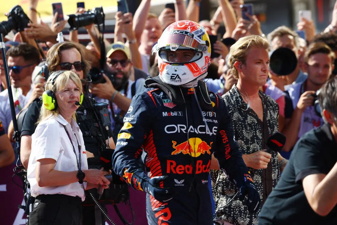 Red Bull's Max Verstappen celebrating after winning the Hungarian Grand Prix for his ninth victory this season in 11 races.