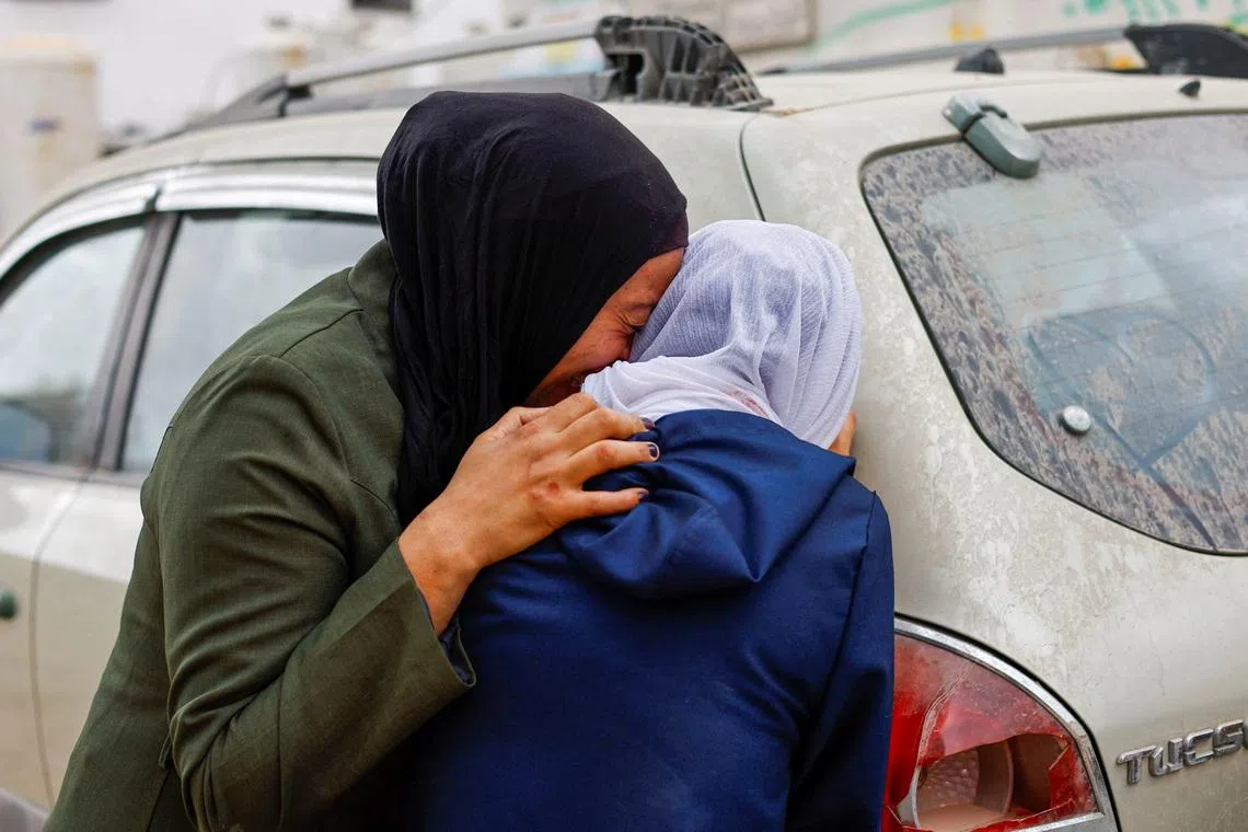 Mourners react during the funeral of Palestinian Mohammed Al-Ghandour, who was killed in an Israeli strike overnight, according to medics, at Al-Shifa Hospital in Gaza City, May 5, 2026. REUTERS/Mahmoud Issa