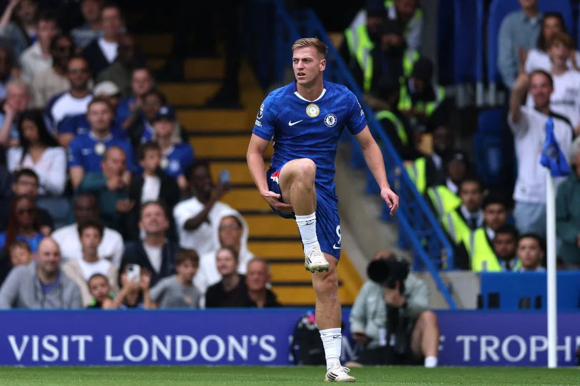 FILE PHOTO: Soccer Football - Premier League - Chelsea v Fulham - Stamford Bridge, London, Britain - August 30, 2025 Chelsea's Liam Delap reacts after sustaining an injury Action Images via Reuters/John Sibley/ File Photo