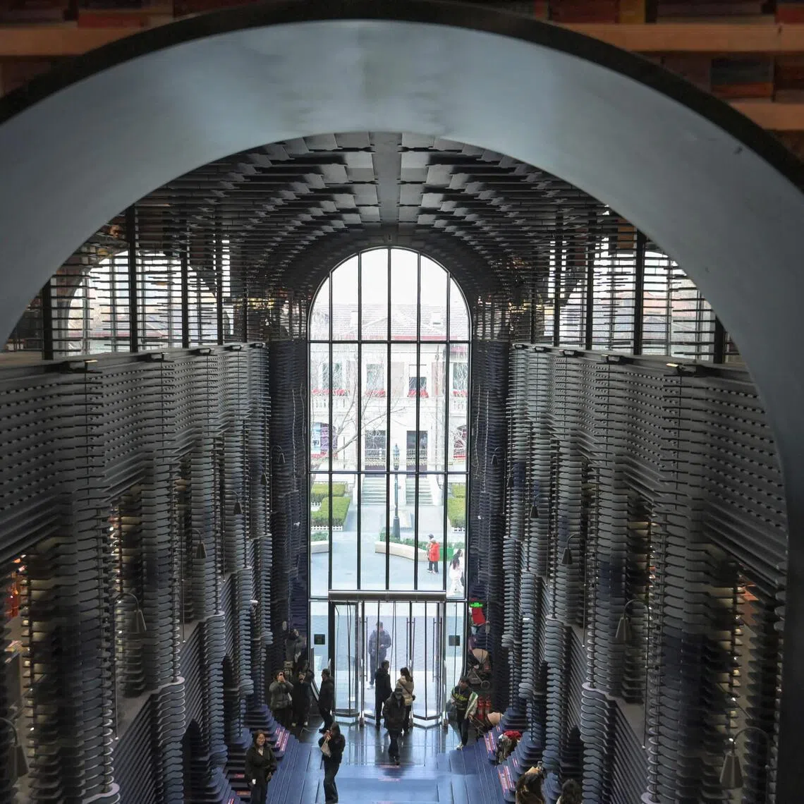 Opened in September 2024, the Zhongshuge bookstore in Tianjin, China, on social media draws comparisons to boy wizard Harry Potter’s Gothic Hogwarts school in the film series. 