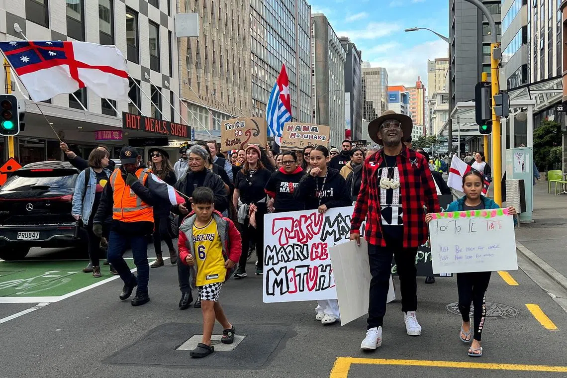 FILE PHOTO: Te Pati Maori co-leader Rawiri Waititi (r)  takes part in a march to demonstrate against the incoming government and its policies, in Wellington, New Zealand, December 5, 2023. REUTERS/Lucy Craymer/File Photo