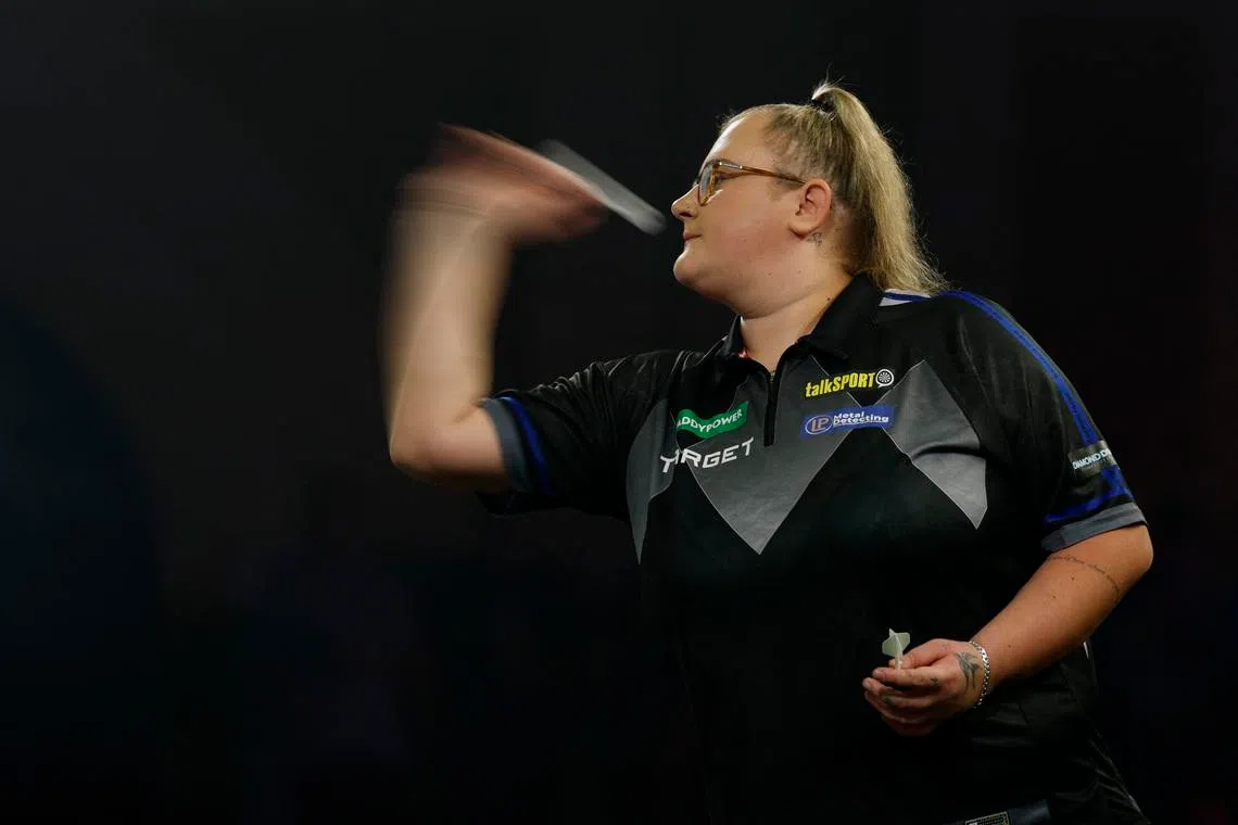 Darts - World Darts Championship - Alexandra Palace, London, Britain - December 19, 2025 Beau Greaves in action during her first round match against Daryl Gurney Action Images via Reuters/Peter Cziborra/File Photo