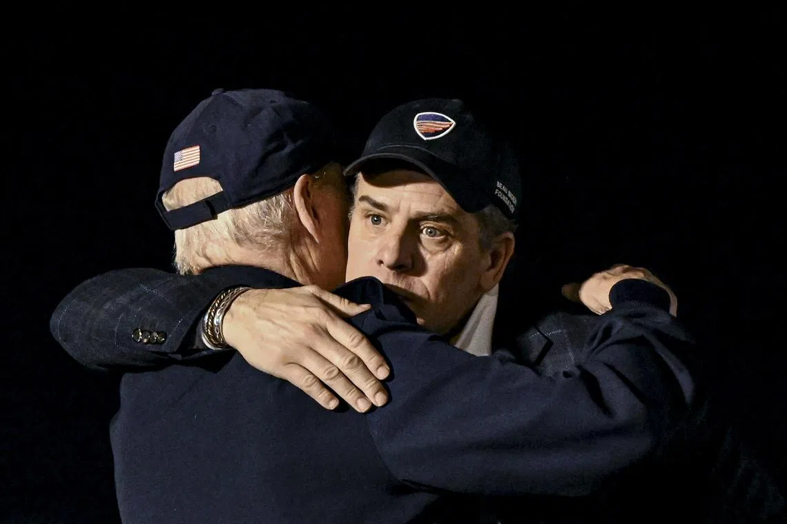 US President Joe Biden (left) hugs his son, Hunter, before leaving Ireland in April 2023.