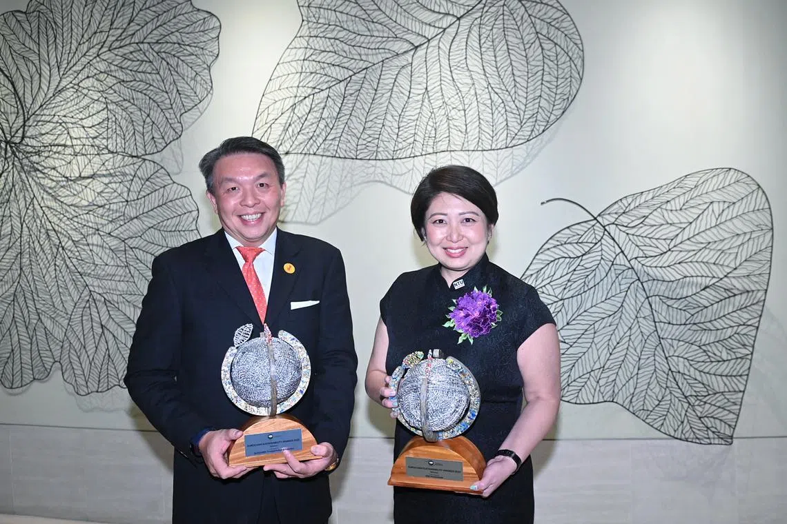 DHL Express Singapore managing director Christopher Ong and NTU senior vice-president (administration) Tan Aik Na at the EuroCham Sustainability Awards.