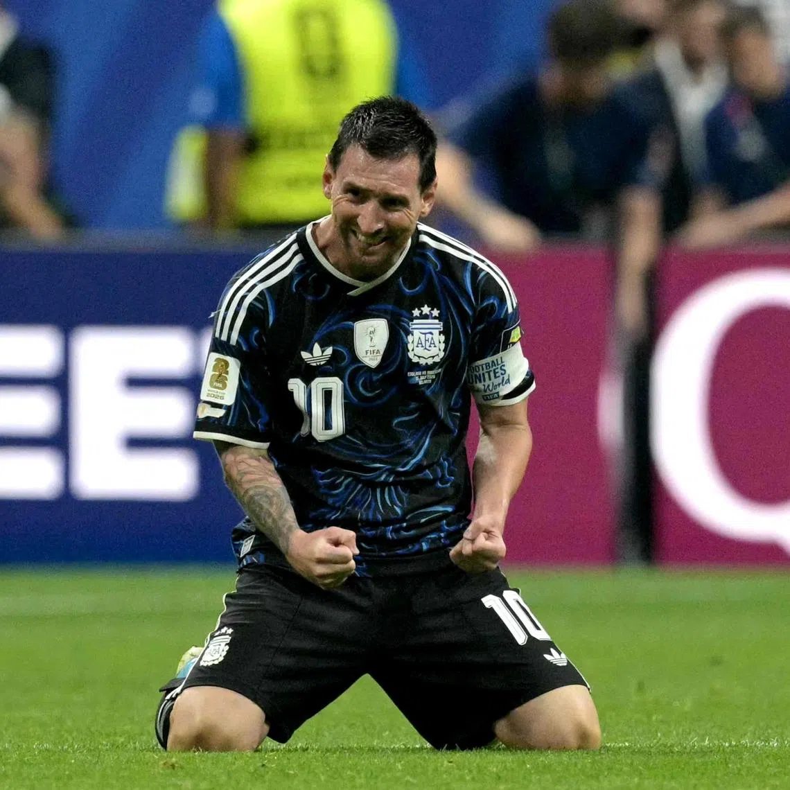 Lionel Messi celebrates after Argentina beat England to reach the World Cup final.
