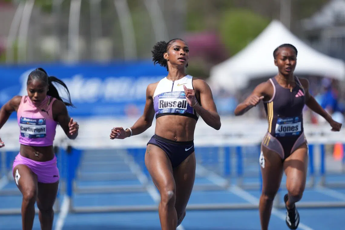 Apr 26, 2025; Des Moines, IA, USA; Masai Russell wins the women's 100m hurdles in 12.74 during the 115th Drake Relays at Drake Stadium. Kirby Lee-Imagn Images/File Photo