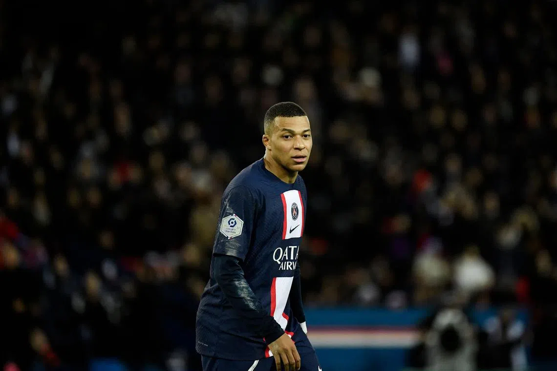 Kylian Mbappe converted a 96th minute penalty to give PSG a 2-1 win against Strasbourg following the World Cup break.