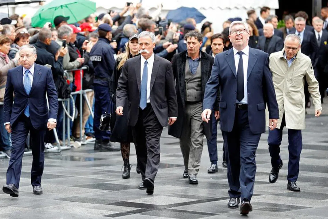 Federation Internationale de l'Automobile (FIA) President Jean Todt, Formula One Managing Director of Motorsports Ross Brawn and Formula One group CEO Chase Carey arrive to attend Niki Lauda's funeral ceremony at St Stephen's cathedral in Vienna, Austria May 29, 2019. REUTERS/Leonhard Foeger/ File Photo