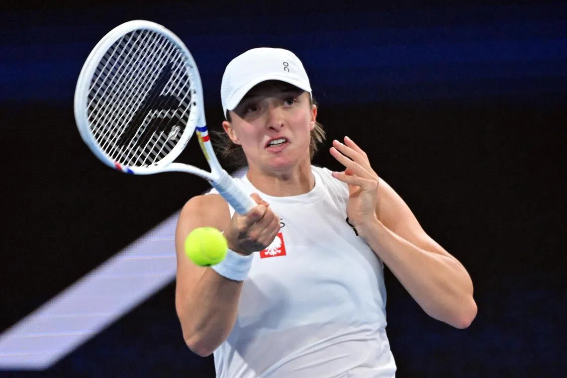 Iga Swiatek of Poland in action during her 6-1, 6-0 thrashing of Malene Helgo of Norway at the United Cup at Ken Rosewall Arena in Sydney on Dec 30.