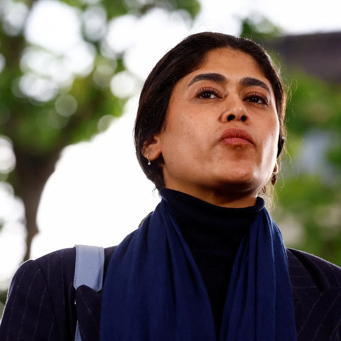FILE PHOTO: Member of the European Parliament Rima Hassan, of the French far-left opposition party La France Insoumise (France Unbowed - LFI), attend a political rally by the alliance of left-wing parties, called the \"Nouveau Front Populaire\" (New Popular Front) in Montreuil, near Paris, on the first day of official campaigning for the upcoming French parliamentary elections, France, June 17, 2024.  REUTERS/Sarah Meyssonnier/File Photo