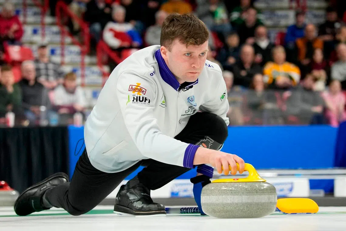 Curling - World Men's Curling Championship - Mosaic Place, Moose Jaw, Saskatchewan, Canada - April 6, 2025 Scotland's Bruce Mouat celebrate after winning their bronze medal match against Switzerland REUTERS/Todd Korol