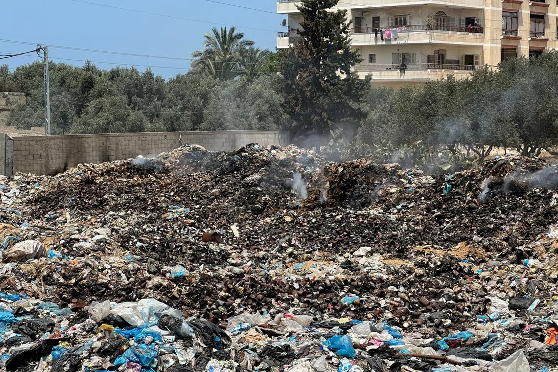 FILE PHOTO: A view shows piles of garbage, amid the ongoing conflict in Gaza between Israel and Hamas, at Deir Al-Balah, in the central Gaza Strip, May 2, 2024. REUTERS/Doaa Rouqa/File Photo