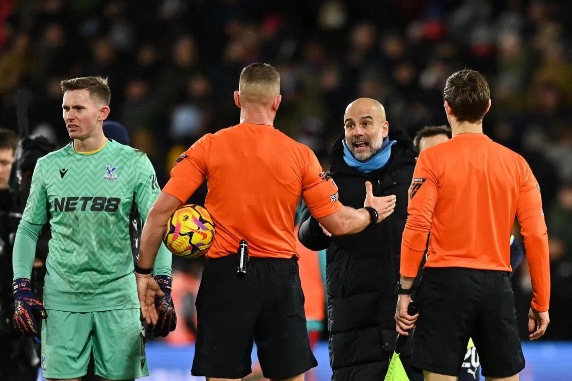 Manchester City manager Pep Guardiola argues with the referee after the 2-2 Premier League draw with Crystal Palace.