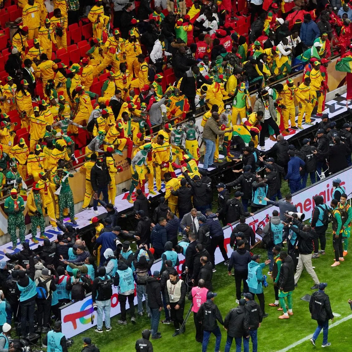 Soccer Football - CAF Africa Cup of Nations - Morocco 2025 - Final - Senegal v Morocco - Prince Moulay Abdellah Stadium, Rabat, Morocco - January 18, 2026 Senegal fans react in the stand after Morocco were awarded a penalty following a VAR review REUTERS/Strin
