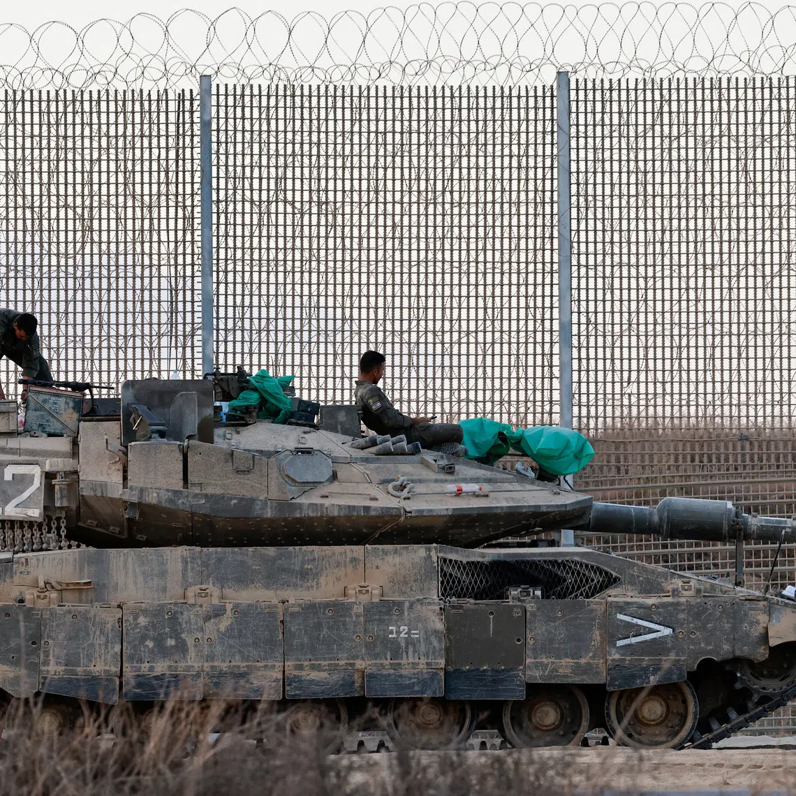 An Israeli tank stands on the Israeli side of the border with Gaza, in Israel, October 19, 2025. REUTERS/Amir Cohen