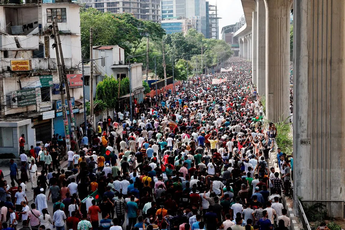 FILE PHOTO: People celebrate the resignation of Prime Minister Sheikh Hasina in Dhaka, Bangladesh, August 5, 2024. REUTERS/Mohammad Ponir Hossain/File Photo