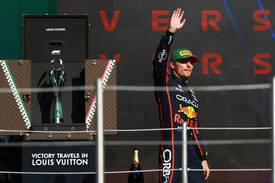 Formula One F1 - Mexico City Grand Prix - Autodromo Hermanos Rodriguez, Mexico City, Mexico - October 26, 2025 Red Bull's Max Verstappen celebrates on the podium after finishing third place in the Mexico City Grand Prix REUTERS/Raquel Cunha