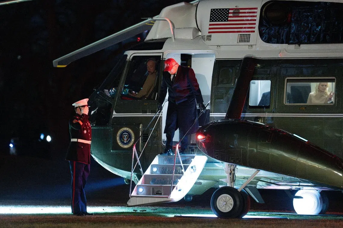 US President Donald Trump exiting the Marine One helicopter as he returned to the White House on March 1.