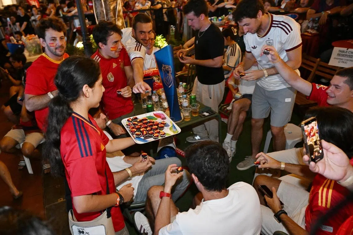 Fans at CHIJMES to catch the FIFA World Cup finals screening on July 20, 2026. ST PHOTO: AZMI ATHNI