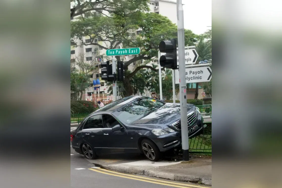 A driver was taken to hospital after his car skidded into a traffic light pole in Toa Payoh on Monday. 