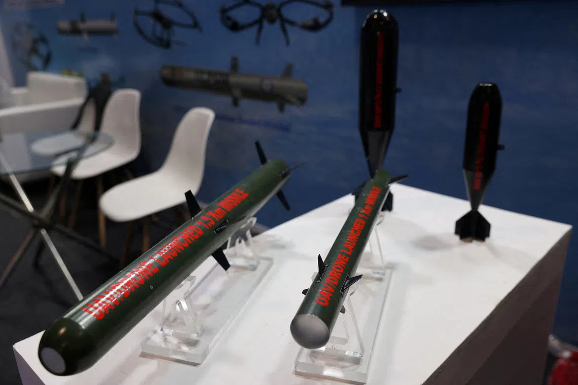 FILE PHOTO: A view shows model missiles used in drones developed by Bharat Dynamics Limited, kept on display at their stall at the drone exhibition at Bharat Drone Shakti 2023 organised by the Indian Air Force(IAF) and Drone Federation of India(DFI) at the Hindon Airbase in Ghaziabad, India, September 25, 2023. REUTERS/Anushree Fadnavis/File Photo