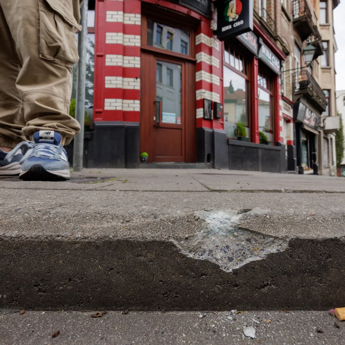 A bullet impact from a heavy automatic weapon mark the location after a shooting incident in Anderlecht, Brussels, Belgium, on Aug 25, 2026.