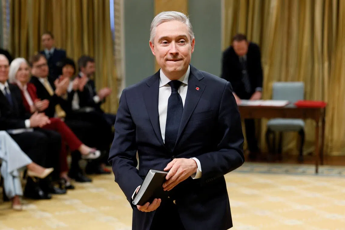 Canadian Finance Minister Francois-Philippe Champagne attends the new cabinet's swearing-in at Rideau Hall in Ottawa, Ontario, Canada March 14, 2025. REUTERS/Blair Gable